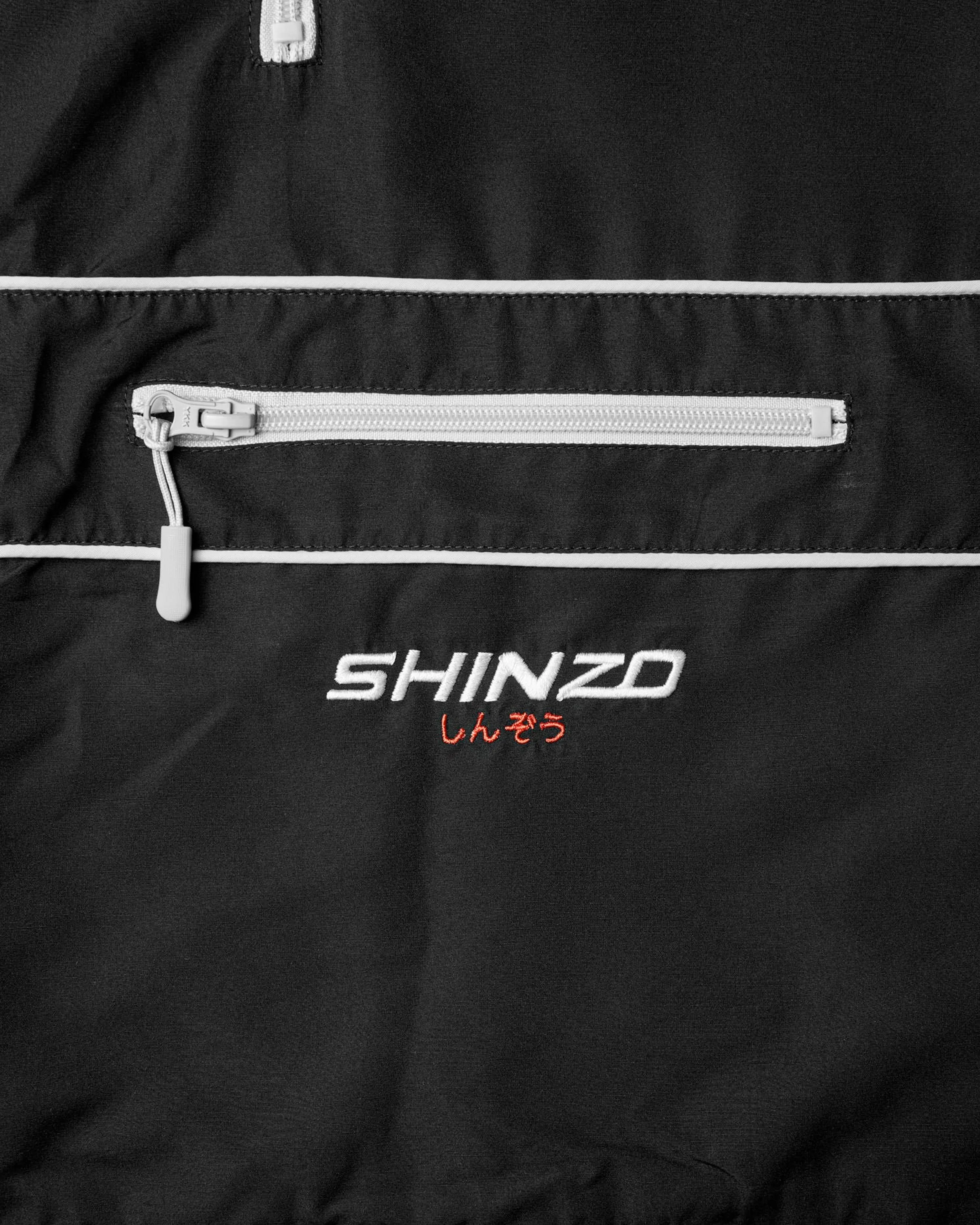 Shinzo Muryō 1.5L Waterproof Technical Piping Jacket Black